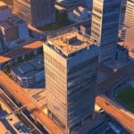 Vista aérea de un moderno centro tecnológico en una ciudad al atardecer