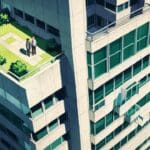 Vista aérea de un moderno edificio de oficinas rodeado de áreas verdes