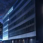 Edificios modernos de Providencia iluminados al anochecer, con enfoque en innovación y tecnología.