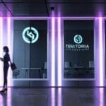 Moderna oficina tecnológica con logotipo futurista en las ventanas y pantallas digitales