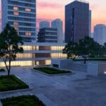 Vista moderna de un parque empresarial con edificios de innovación y tecnología al amanecer