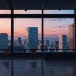 Vista panorámica de un distrito tecnológico moderno con edificios de oficinas iluminados al amanecer