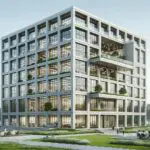 Fachada de un moderno edificio tecnológico de seis pisos, rodeado de áreas verdes y espacios colaborativos.