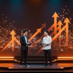 Fundadores de startups de Da Nang recibiendo premios por innovación en el Programa Nacional de Startups 2025 con elementos tecnológicos y ecosistema emergente.