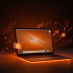 MacBook Neo con chip Apple A18 Pro destacado en ambiente moderno con iluminación naranja y negra, simbolizando tecnología económica para startups.