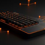Teclado con trackpad inalámbrico modular Framework resaltado en luz naranja y negro matificado, representando la innovación en hardware modular y ecosistemas abiertos.