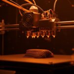 Impresora 3D Mova AtomForm Palette 300 con ruleta de 12 boquillas mostrando impresión multimaterial eficiente y reducción de residuos para startups.