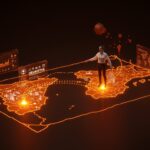 Inversión de Unicaja en startup vasca Heuristik con migración a Granada representada con luces naranjas y símbolos de IA.