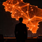 Director de tecnología observando una red neuronal sobre el mapa de Colombia, simbolizando la transformación digital de las mipymes en ANDICOM 2026.